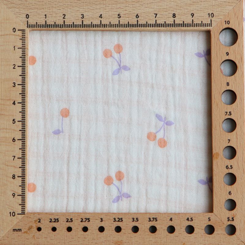 Cherry - Double gaze de coton double face coloris blanc cerises et quadrillage parme et orange