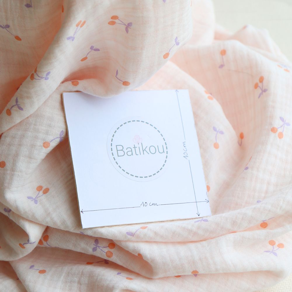 Cherry - Double gaze de coton double face coloris blanc cerises et quadrillage parme et orange