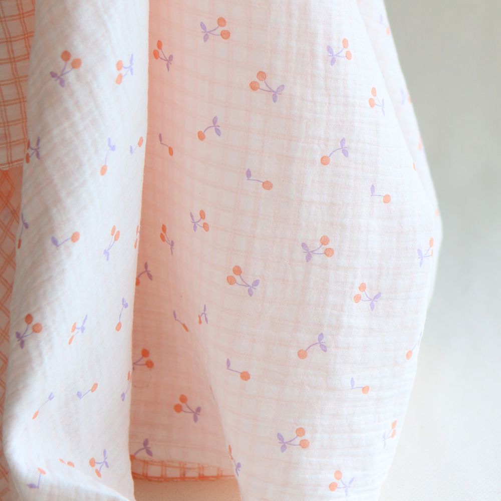 Cherry - Double gaze de coton double face coloris blanc cerises et quadrillage parme et orange